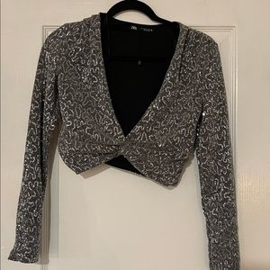 Zara Size M sequin silver long sleeve top. Never worn